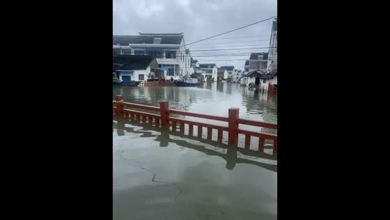 Floodwaters cover roads in residential area in Jiangsu, China