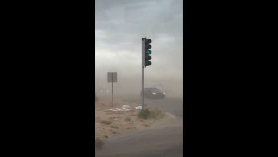 Massive dust storm reduces visibility on road in New Mexico, USA