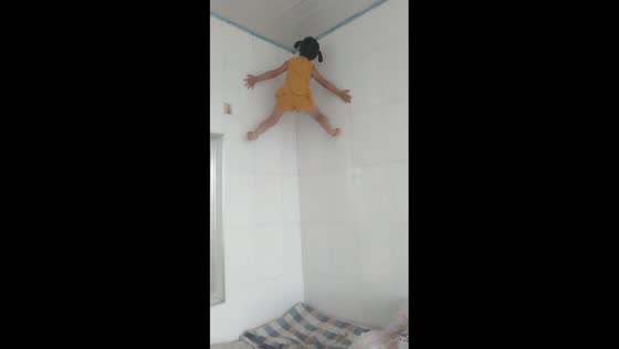 Gravity-defying feat: fearless granddaughter climbs walls with ease, astonishing all!