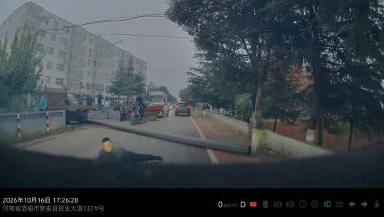 Man and elderly pedestrian trip over a plastic conduit pipe in Henan, China
