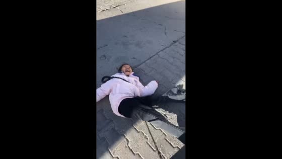 Dog knocks girl down in Inner Mongolia, China