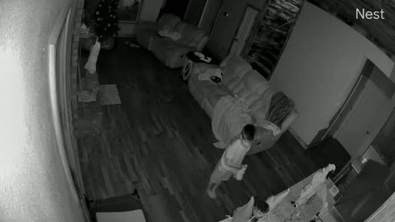 Child startled by moving elf decoration at home in Walker, USA