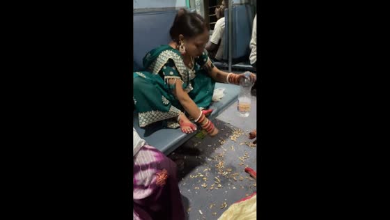 Passenger leaves trash under train seat in India