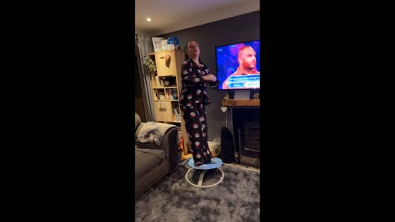 Woman loses balance on spinning chair in Brynmawr, Wales, UK