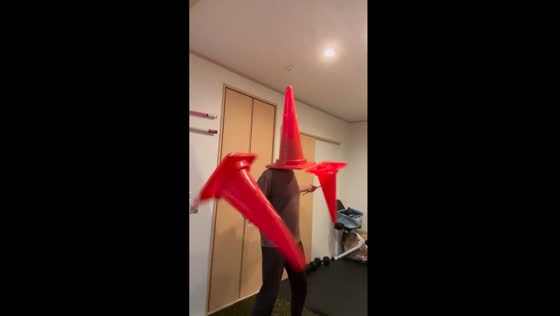 Advanced devil sticks juggling with colored cones