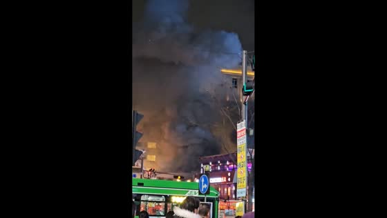 Thick smoke rises from burning building near Seoul City Hall Station in Seoul, South Korea