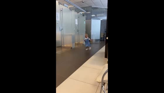 Toddler’s diaper falls while running inside bank in Gorki, Belarus