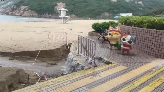 Flooded golf course and halted buses in Shek O, Hong Kong