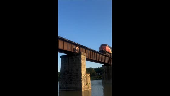 Two men dive from railway bridge as train passes in Caledonia, Ontario, Canada