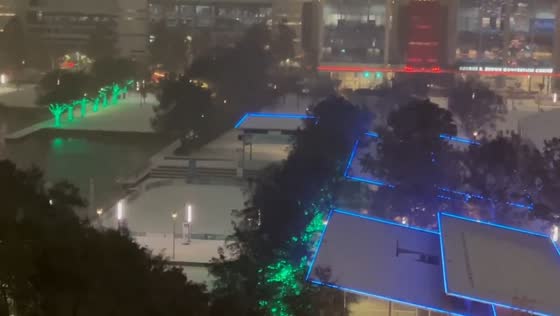  Snow blankets Discovery Green Park in Houston, Texas, USA