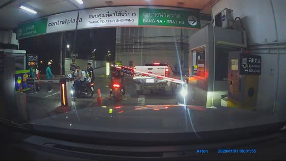 Motorcycle riders hit by parking gate in Bangkok, Thailand