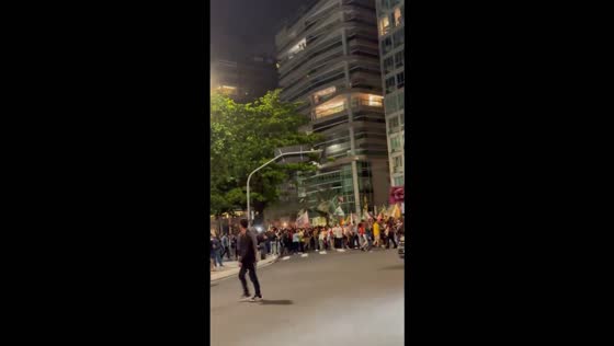 UFF students celebrate Lula’s election victory during a street march in Niterói, Brazil