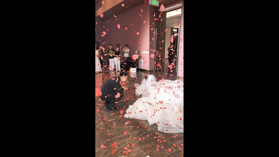 Bride trips while entering wedding reception in Heilongjiang, China