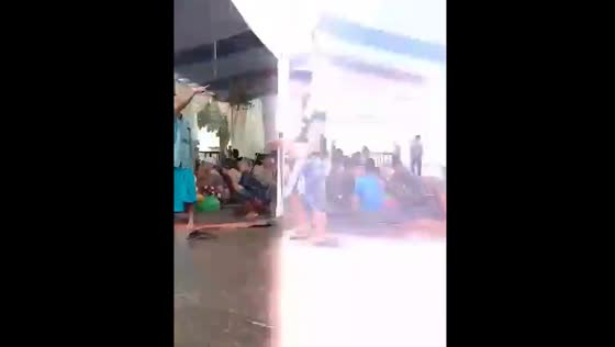 Lightning strikes near people during a wedding reception in Jember, Indonesia