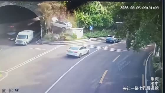Car goes airborne before crashing into hillside in Chongqing, China