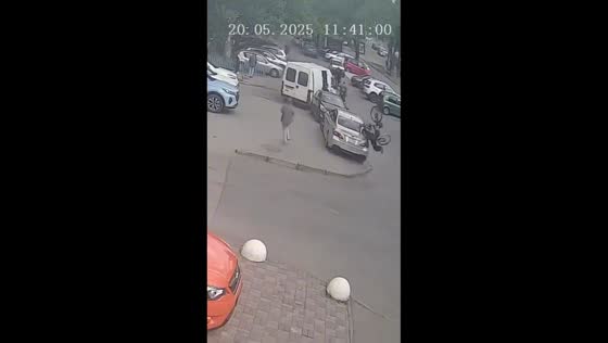 Cyclist crashes into parked vehicle causing damage in Rostov-on-Don, Russia