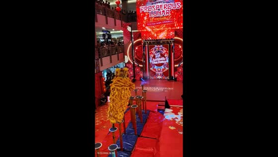 Lion dance performers fall during Lunar New Year show in Surabaya, East Java, Indonesia