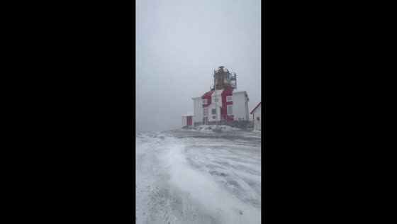 Windy pre-storm waves crash along the coast in Cape Bonavista, Newfoundland, Canada
