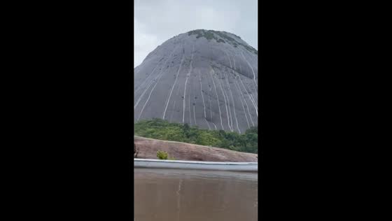 Heavy rainfall creates waterfall-like streams over Mavecure Hills in Colombia