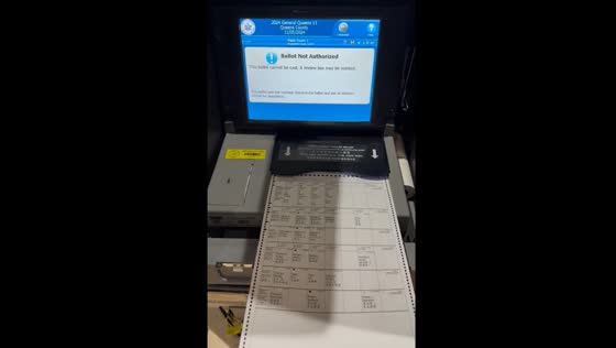 Polling machine rejects ballot at PS 184 polling station 