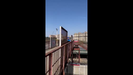 Passerby stops elderly man from jumping off bridge in Moscow, Russia