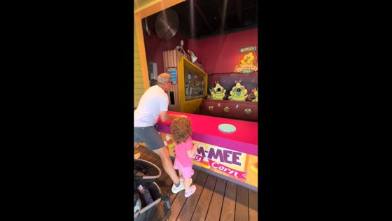 Little girl makes perfect shot at Disneyland Adventure Park in Anaheim, California