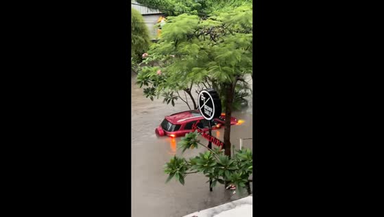 Flooded streets after heavy rain in Denpasar, Bali, Indonesia