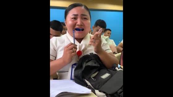 Girl accidentally gets ballpen ink on her mouth in Cagayan de Oro, Philippines