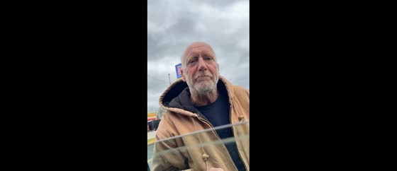 An old guy jokes about witches riding their brooms in Danville, Illinois, USA