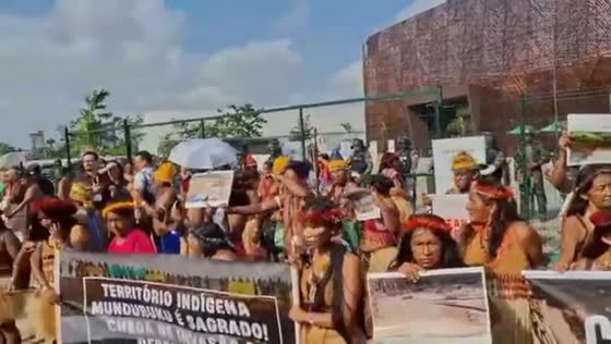 Indigenous groups demand climate justice at COP30 entrance in Belém, Brazil