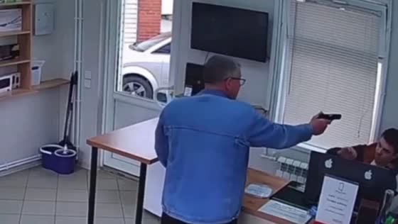 Store employee threatened during armed robbery in Gatchinsky, Russia