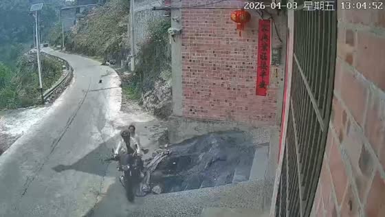Motorcycle collision on curvy road in Guangxi, China