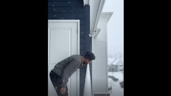 Person gives themselves a brain freeze by sniffing snow in New Orleans