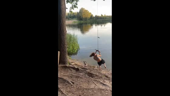 Rope swing mishap sends woman into a lake in Vilnius, Lithuania