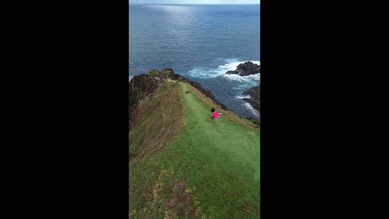 Tourist slips and falls near cliff edge in Baras, Philippines