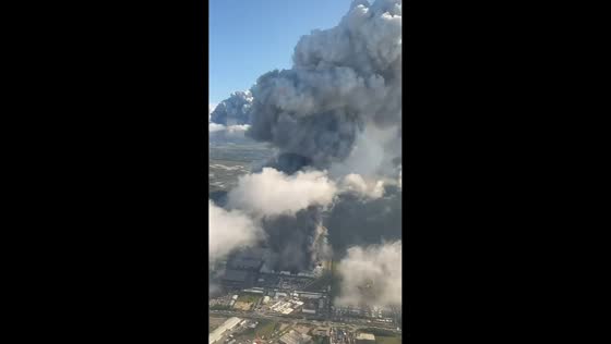 Aerial footage shows massive warehouse fire after drone strike in St. Petersburg, Russia
