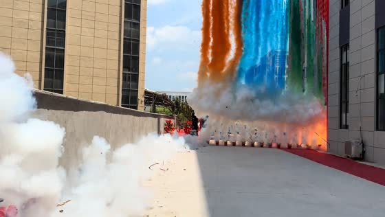 Man launches light-colored smoke firework during event in Zhejiang, China