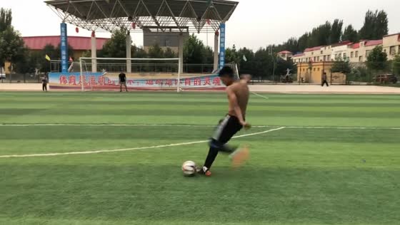 Football kick rebounds off goal frame, hits bystander in Xinjiang, China