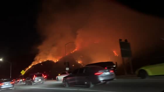 Firestorm burns 40 acres near Getty Center in Los Angeles, California, USA
