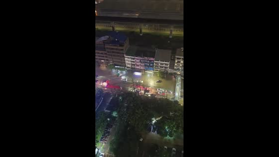 Deep floodwater leaves vehicles stranded in Bangkok, Thailand