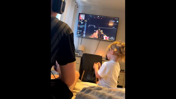 Toddler turns off TV during father's game in Pontefract, England, UK