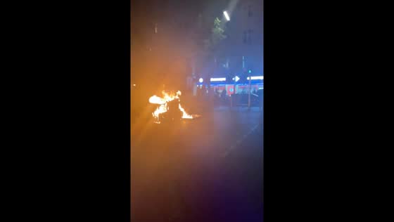 Pro-Palestine protesters burn items on Sonnenallee in Berlin amid Israel-Gaza conflict