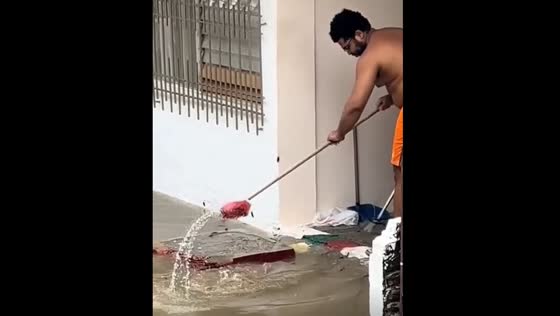 Flooded area in Cali filled with bugs trying to enter homes