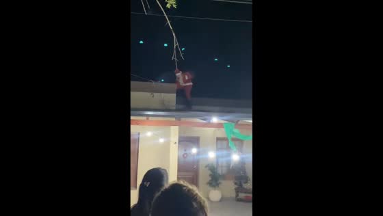 Santa Claus trips on roof in Santa Fe, Argentina