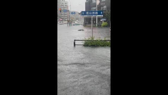 Flooded street shows sewer water fountain in Liaoning, China