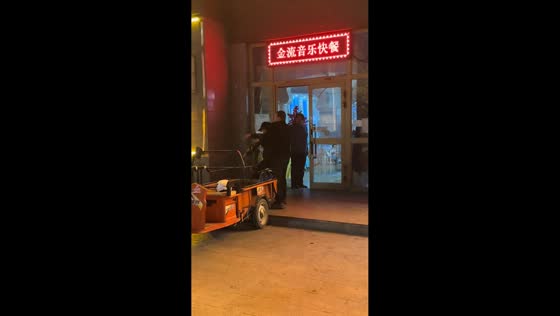 Drunk man loaded onto electric bike outside bar in Xinjiang, China