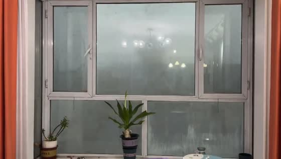 Heavy rain and wind slam windows during storm in Hebei, China