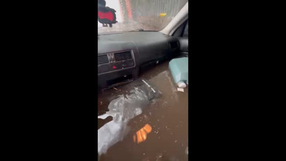 Car flooded in Córdoba as heavy rains cause deluge