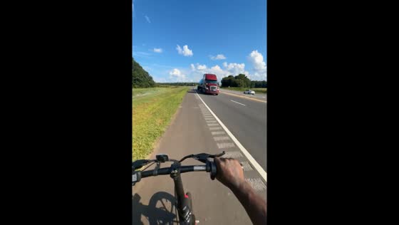 Biker falls off bicycle in Eatonton, Georgia, USA