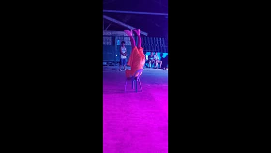 Guy attempts headstand on chair, falls, and breaks it in Calinan, Davao City, Philippines